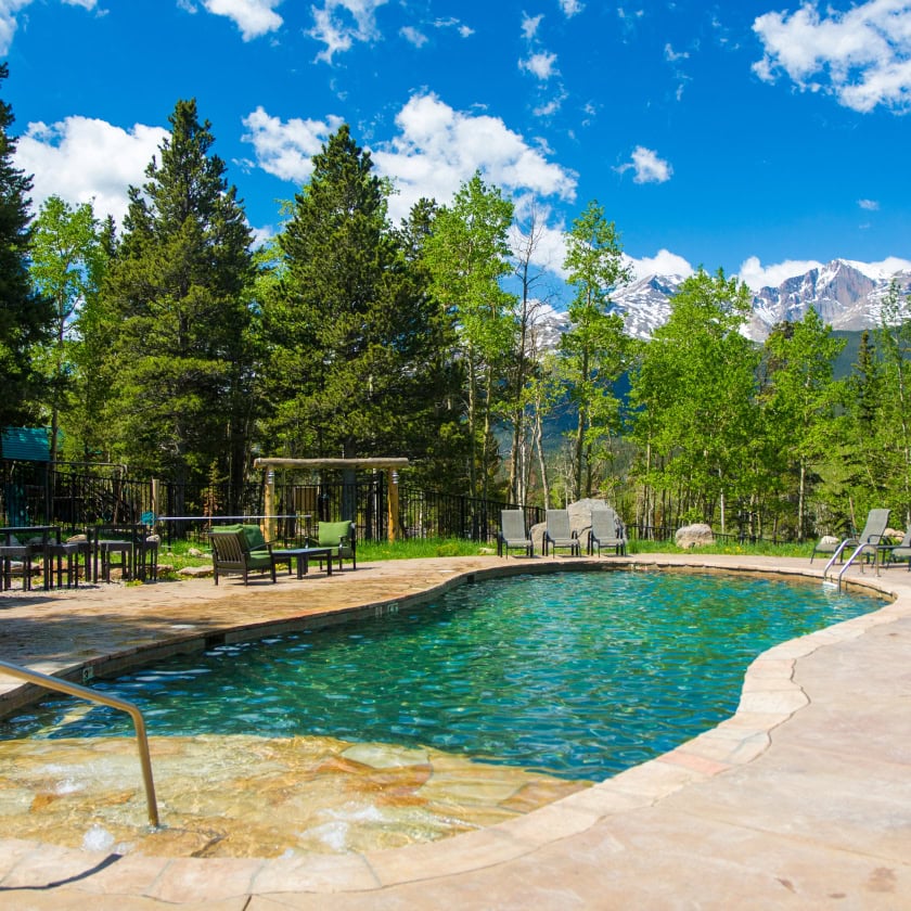 A swimming pool with a mountain view